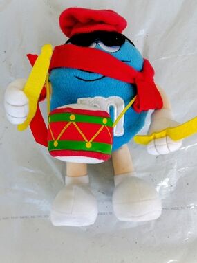 M&M'S Blue Plush Drummer with Red Hat, Scarf and Yellow Drumsticks